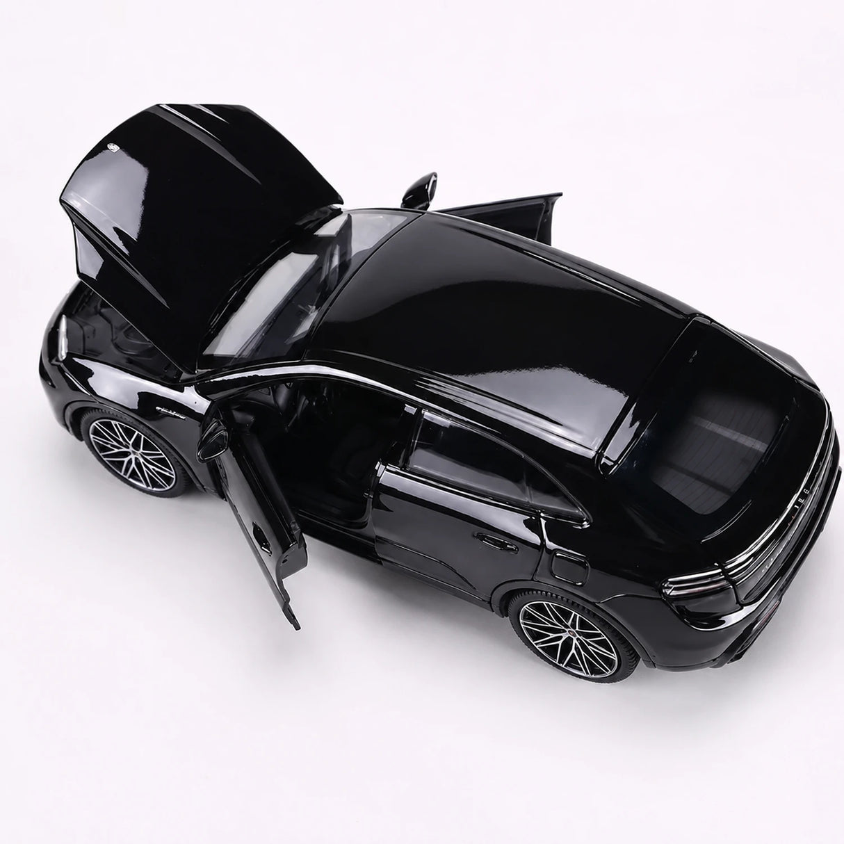 Bburago Porsche 2024 Macan Turbo Black 1:24 – model wyświetlacza odlewany