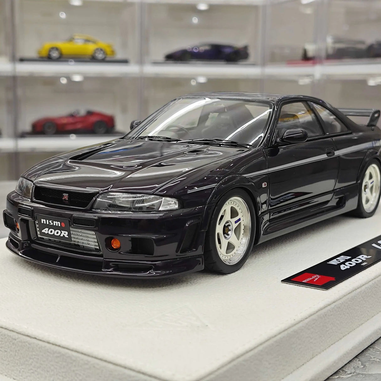 Make Up Nissan 1996 NISMO 400R Purple 1:18 – Resina modello in resina collezionabile