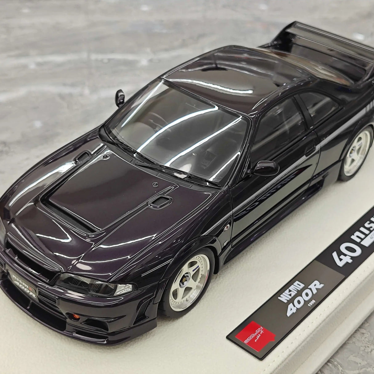 Make Up Nissan 1996 NISMO 400R Purple 1:18 – Resina modello in resina collezionabile