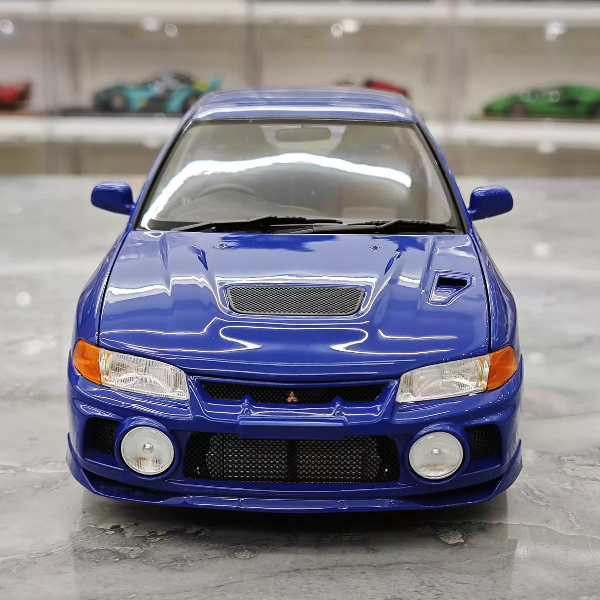 MotorHelix Mitsubishi 1997 Lancer Evolution IV Blue 1:18 – Kolekcjonerski model odlewany z odlewu
