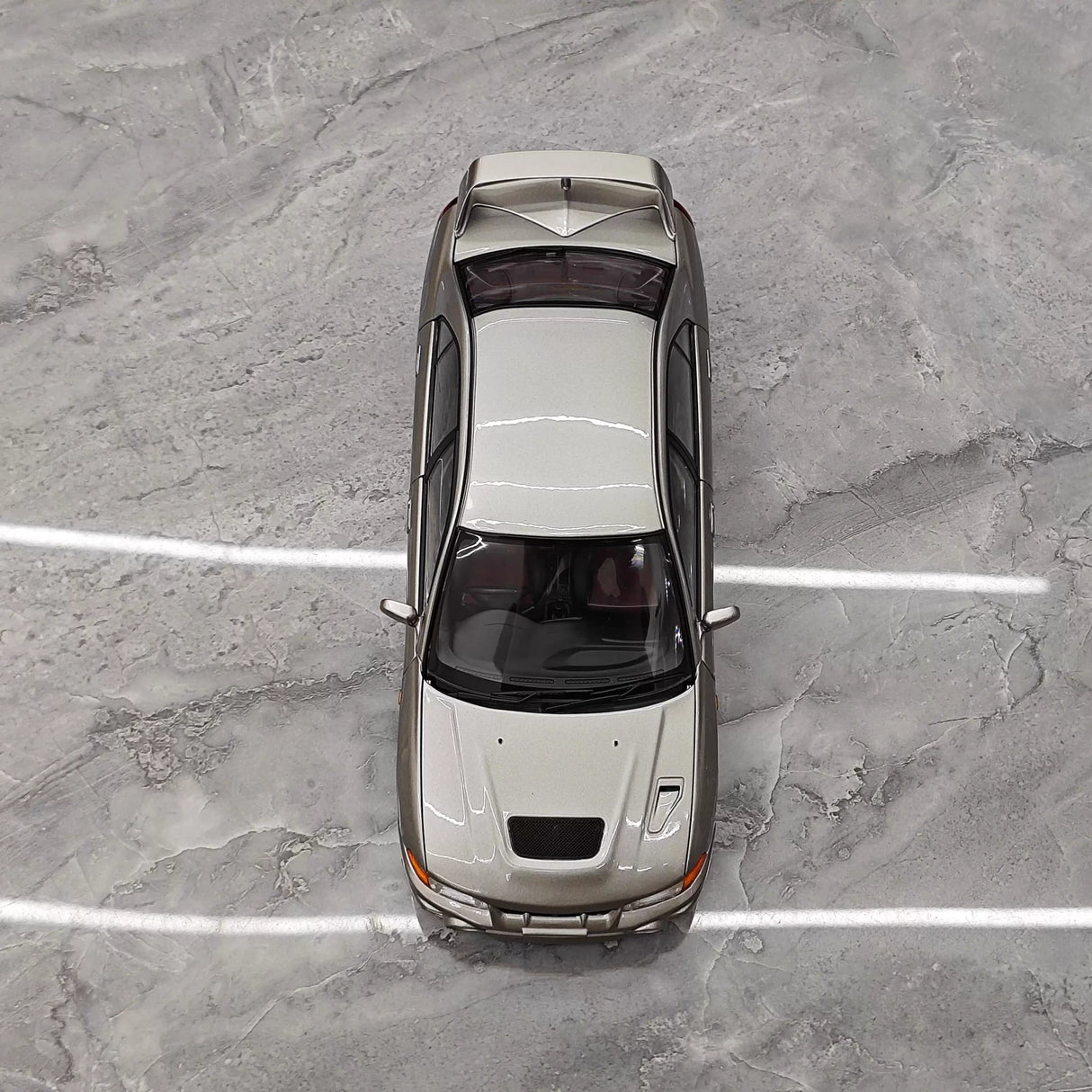 MotorHelix Mitsubishi 1997 Lancer Evolution IV Gray 1:18 – Kolekcjonarski model odlewany