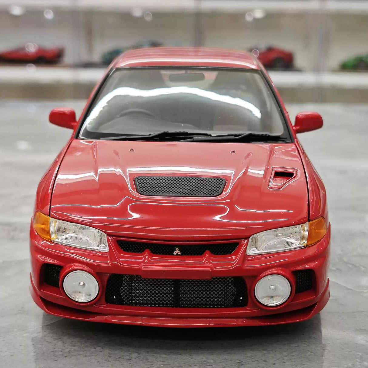 MotorHelix Mitsubishi 1997 Lancer Evolution IV Red 1:18 – Kolekcjonerski model odlewany
