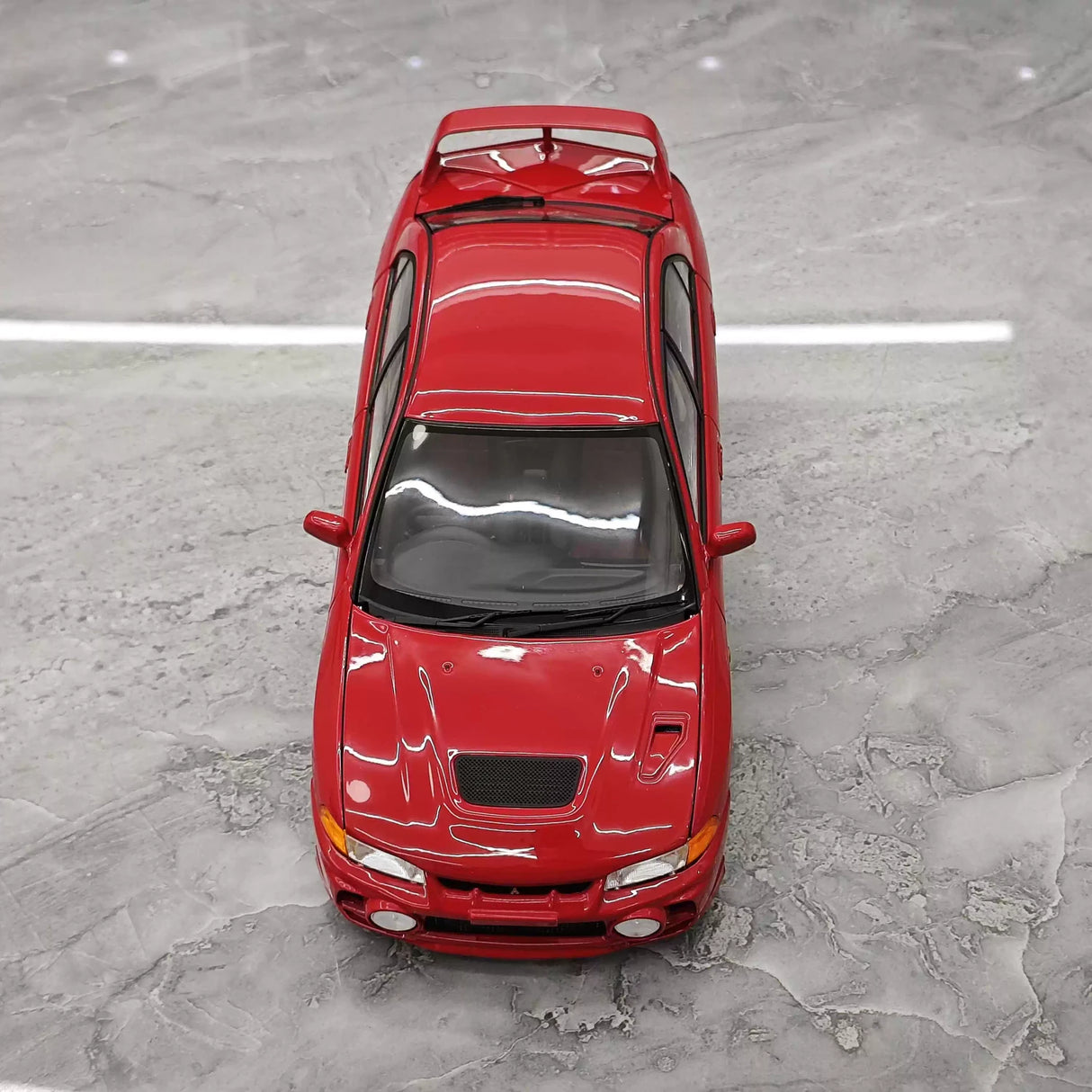 MotorHelix Mitsubishi 1997 Lancer Evolution IV Red 1:18 – Kolekcjonerski model odlewany