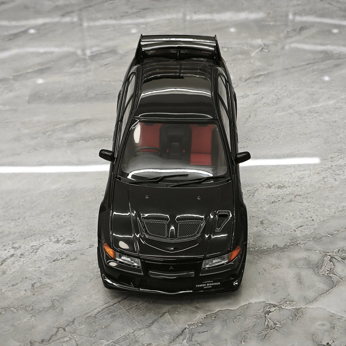 MotorHelix Mitsubishi 2000 Lancer Evolution VI GSR Tommi Makinen Edition Black 1:18 – Sammelobjekt aus Druckguss