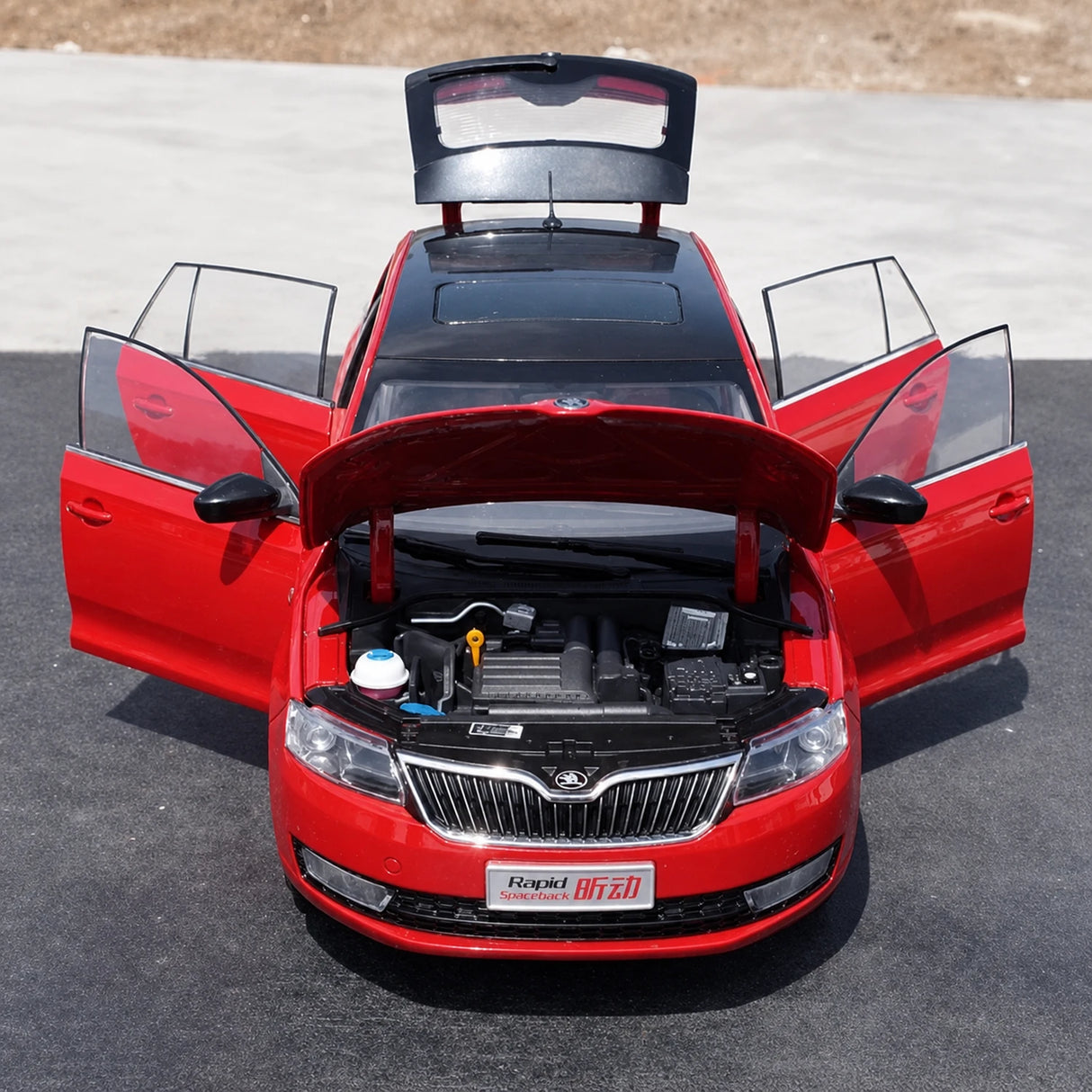 OEM Skoda 2013 Rapid Spaceback Red 1:18 – kolekcjonerski model odlewany