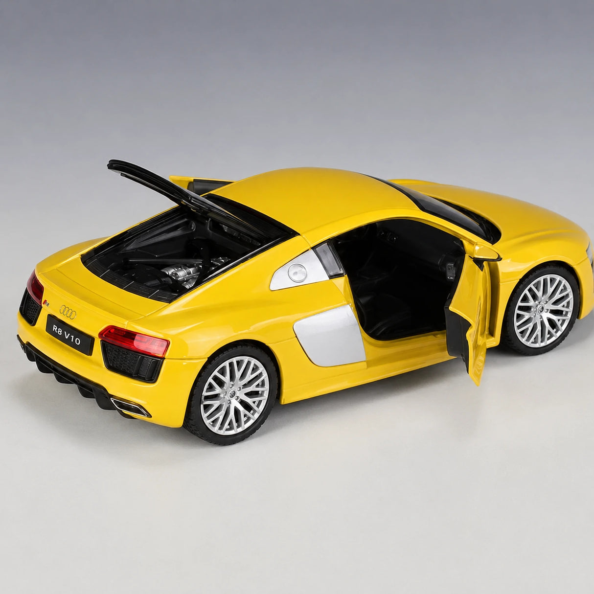Welly Audi 2016 R8 V10 أصفر 1:24 – نموذج عرض معدني مصبوب