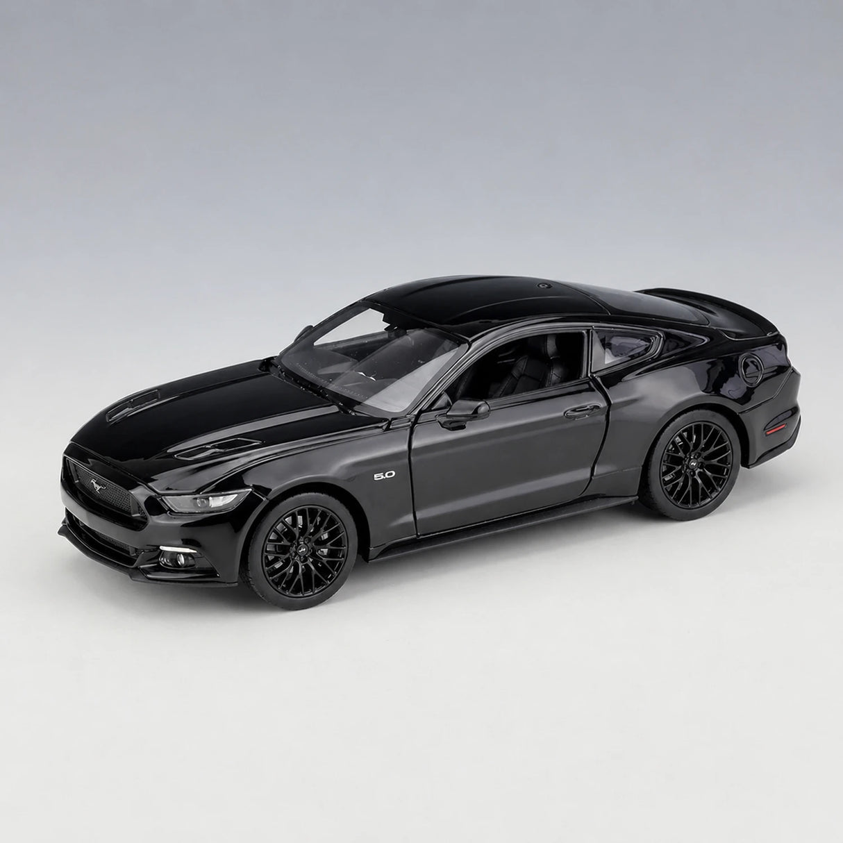 Welly Ford 2015 Mustang GT Glossy أسود 1:24 – نموذج عرض معدني مصبوب