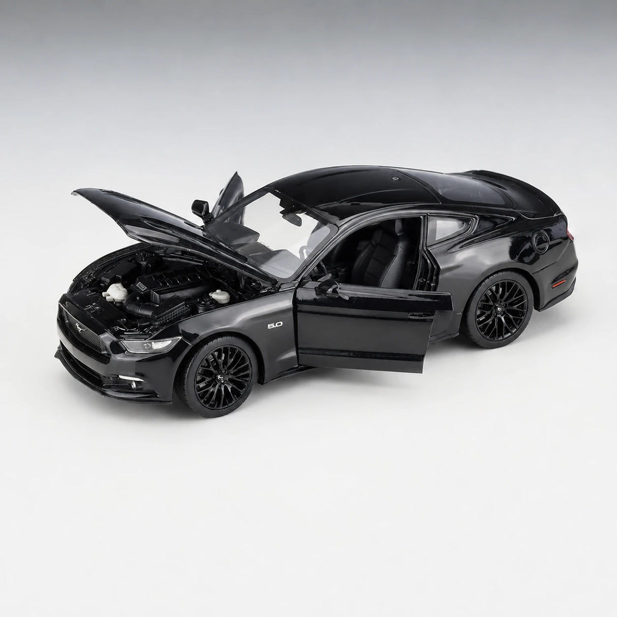 Welly Ford 2015 Mustang GT Glossy أسود 1:24 – نموذج عرض معدني مصبوب