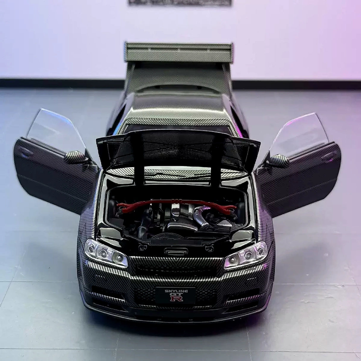 Nissan 1999 Skyline GT-R R34 zwart 1:24 – diecast displaymodel