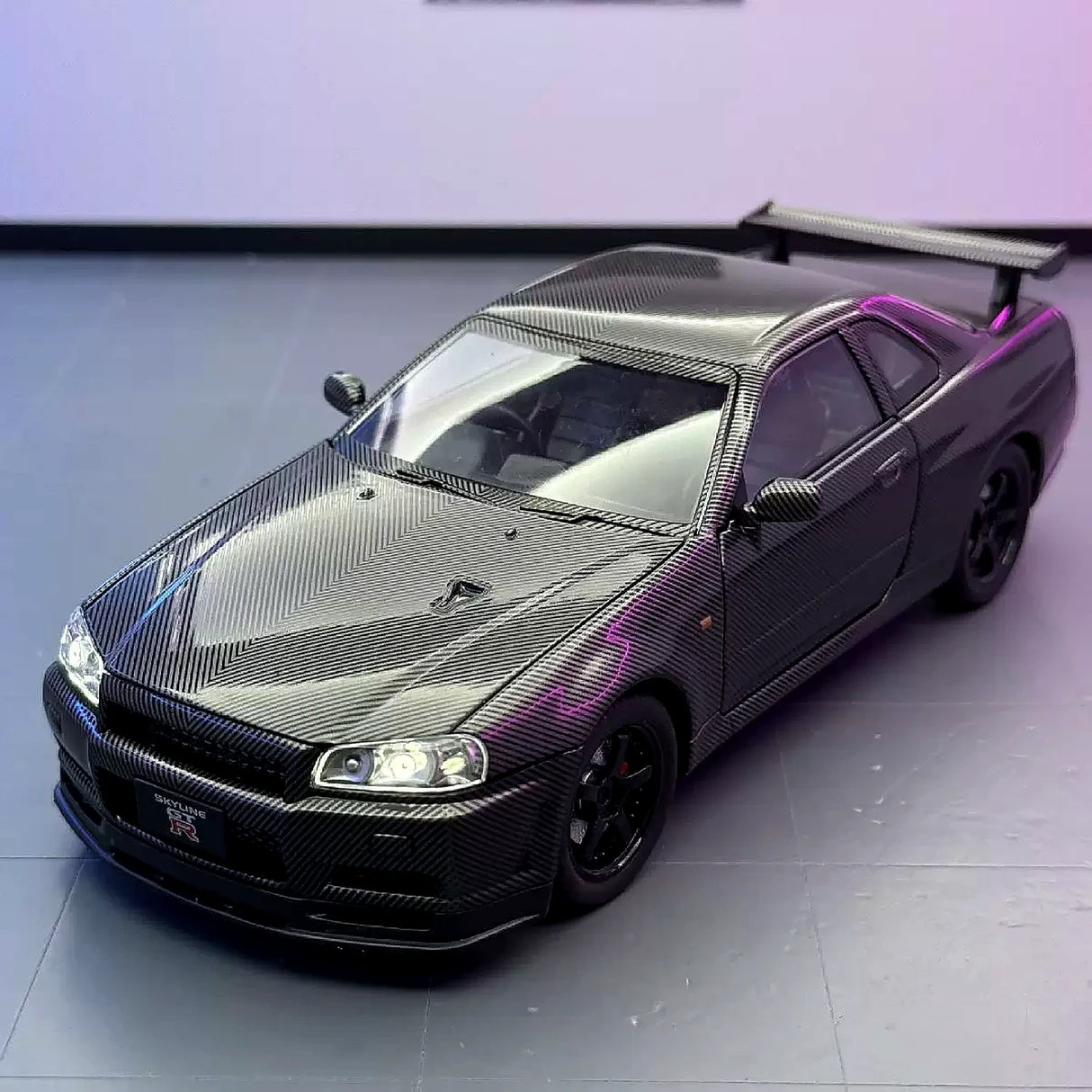 Nissan 1999 Skyline GT-R R34 zwart 1:24 – diecast displaymodel