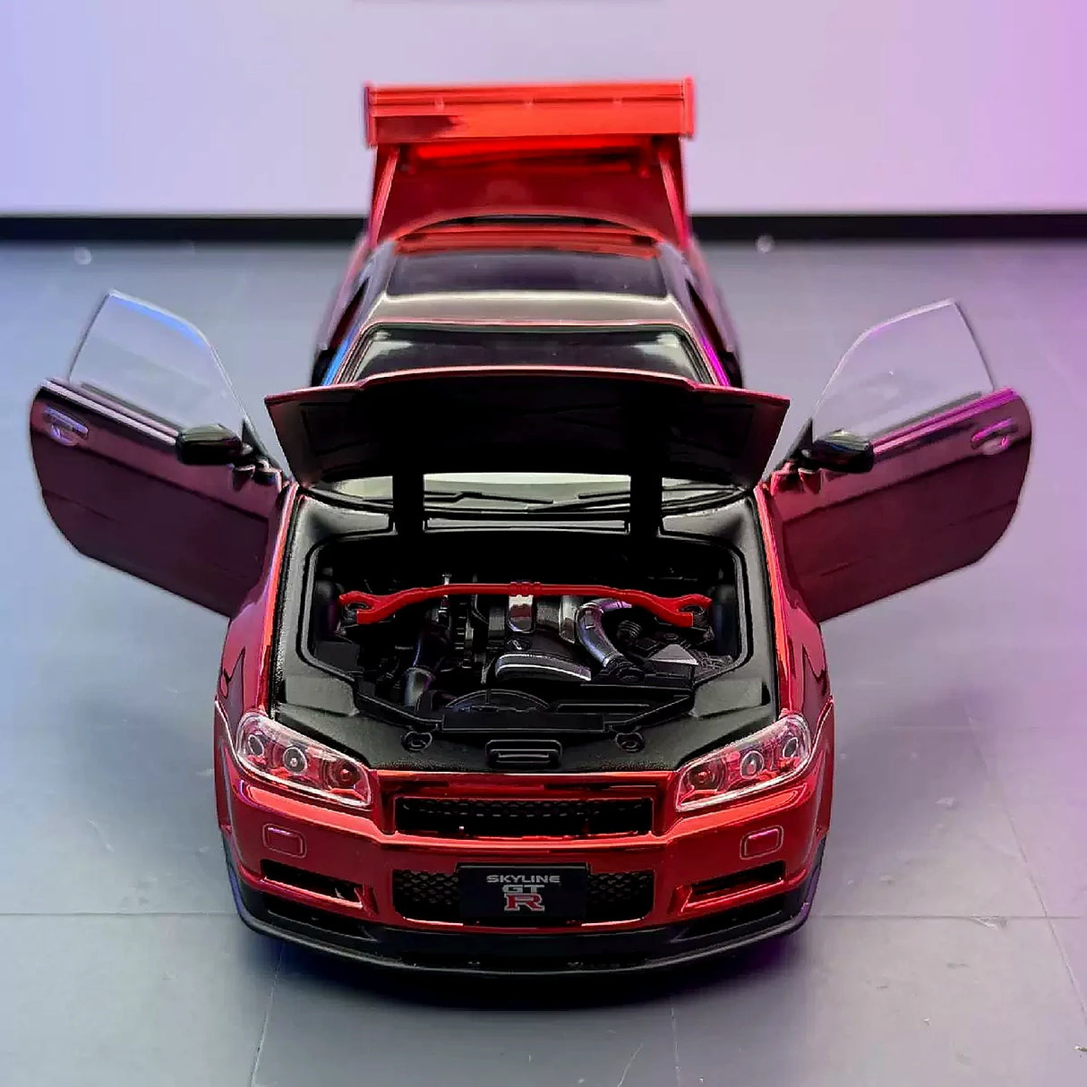 Nissan 1999 Skyline GT-R R34 Metallic rood 1:24 – diecast displaymodel