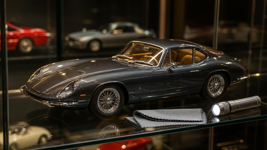 AutoArt-style 1:18 full-opening diecast model car in a premium display cabinet (collector buying guide cover)