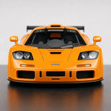 AutoArt McLaren 1995 F1 GTR LM بابايا أورانج 1:18 – نموذج معدني قابل للجمع من القالب المصبوب