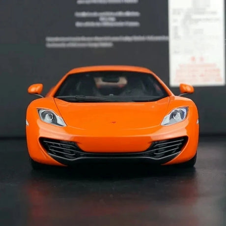 AutoArt McLaren 2011 MP4-12C أورانج 1:18 – نموذج معدني قابل للجمع مصبوب.
