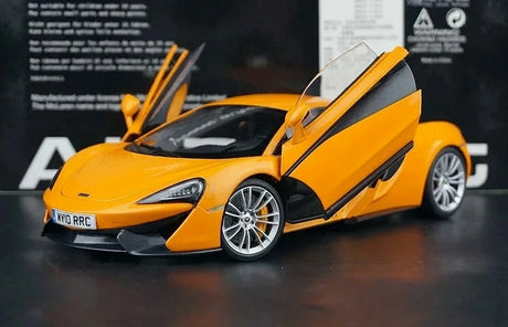 AutoArt McLaren 2015 570S Orange 1:18 – نموذج معدني قابل للجمع مصبوب.