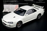 AutoArt Nissan 2000 Skyline GT-R R34 V-Spec II White 1:18 – نموذج معدني قابل للجمع مصبوب.