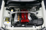 AutoArt Nissan 2000 Skyline GT-R R34 V-Spec II White 1:18 – نموذج معدني قابل للجمع مصبوب.