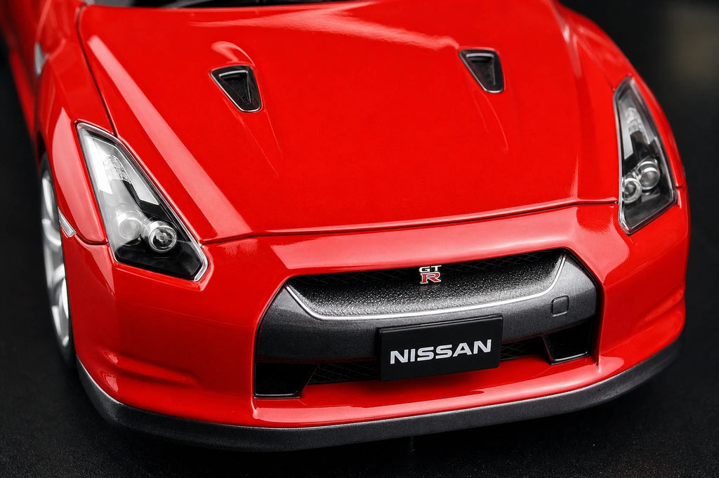 AutoArt Nissan 2009 GT-R R35 ريد 1:18 – نموذج معدني قابل للجمع مصبوب.
