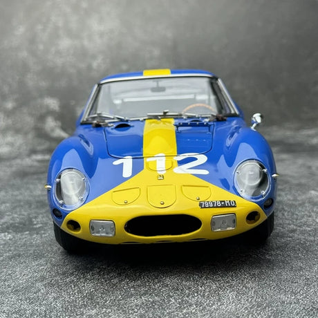 Ferrari 1962 250 GTO #112 Blue and Yellow 1:18 Targa Florio 1964 diecast collectible model by CMC - view 1