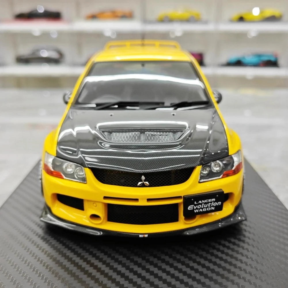 [Ignition] 1:18 Mitsubishi 2005 Lancer Evo IX Wagon gul modellbil harts