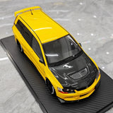 [Ignition] 1:18 Mitsubishi 2005 Lancer Evo IX Wagon gul modellbil harts