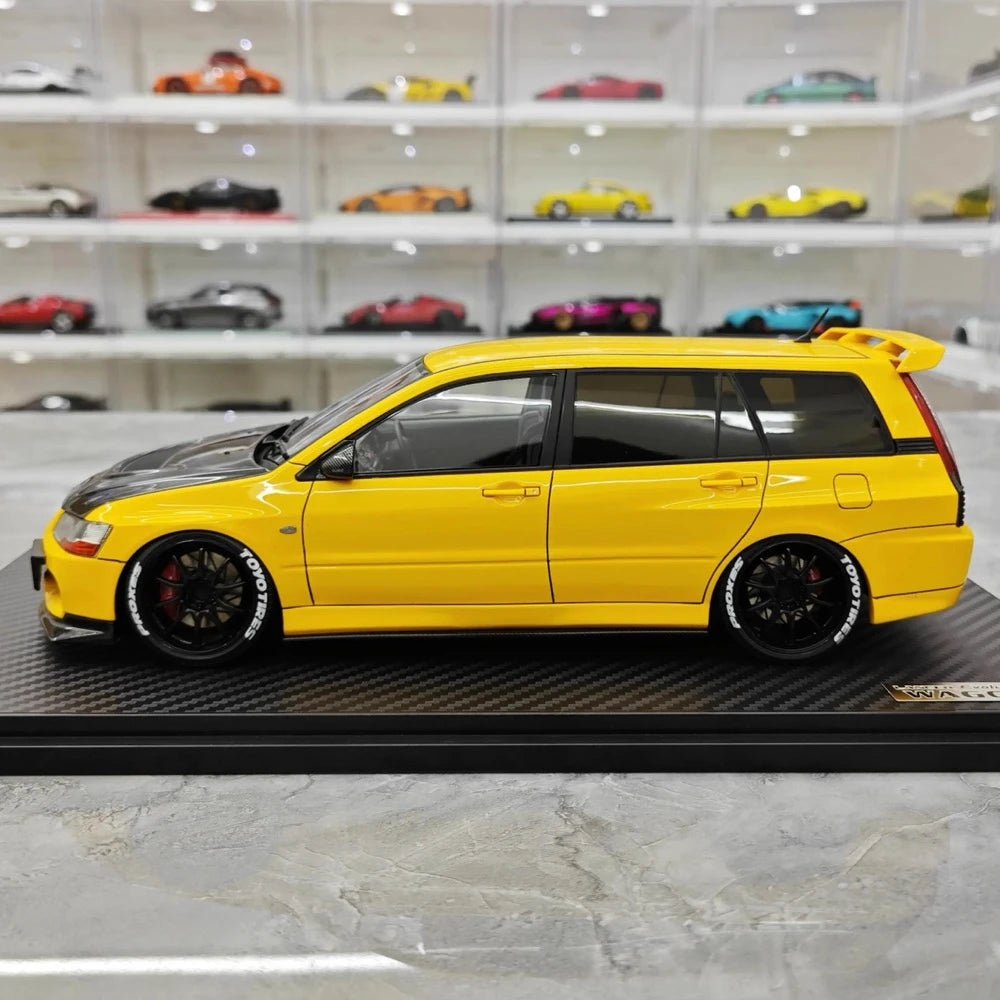 [Ignition] 1:18 Mitsubishi 2005 Lancer Evo IX Wagon gul modellbil harts