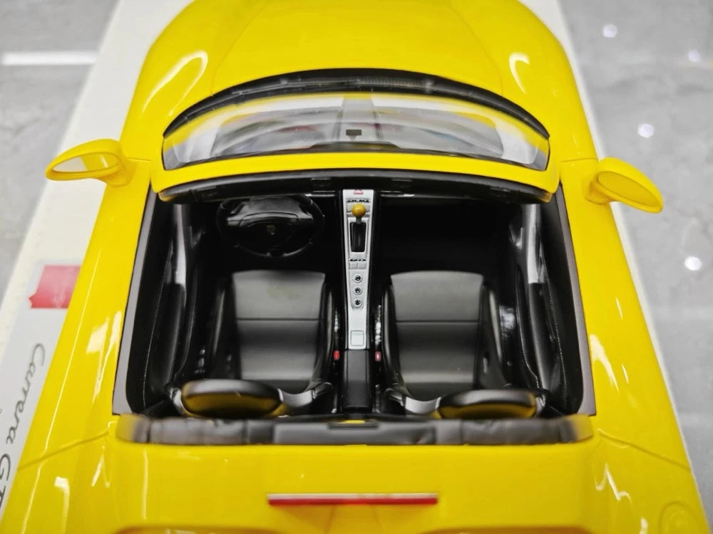 [Make Up] 1:18 Porsche 2004 Carrera GT geel modelauto Hars