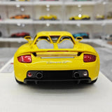 [Make Up] 1:18 Porsche 2004 Carrera GT geel modelauto Hars