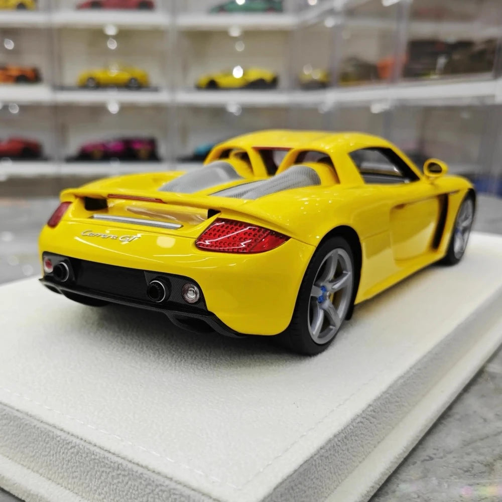 [Make Up] 1:18 Porsche 2004 Carrera GT geel modelauto Hars