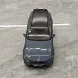 Minichamps BMW 2024 M5 Touring G99 Grey Metallic 1:18 – Verzamelbare resin modelresin resin