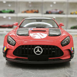 [Minichamps] 1:18 Mercedes-AMG 2021 GT nero Series rosso Pig 50th Anniversary modellino pressofuso