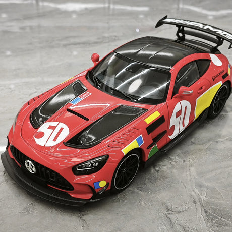 [Minichamps] 1:18 Mercedes-AMG 2021 GT nero Series rosso Pig 50th Anniversary modellino pressofuso