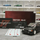 MotorHelix Mitsubishi 2000 Lancer Evolution VI GSR Tommi Makinen Edition preto 1:18 – modelo de coleção em metal fundido
