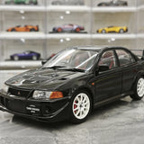 MotorHelix Mitsubishi 2000 Lancer Evolution VI GSR Tommi Makinen Edition preto 1:18 – modelo de coleção em metal fundido