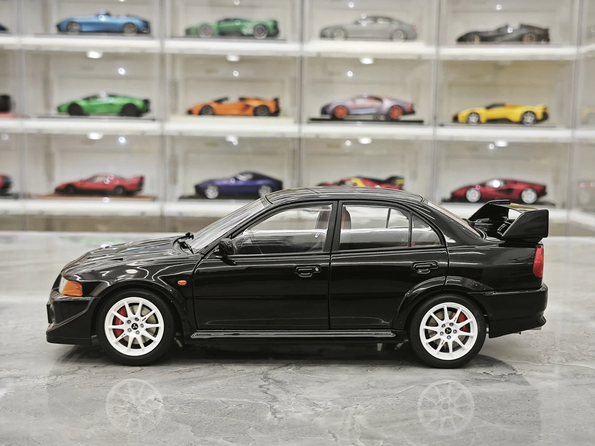 MotorHelix Mitsubishi 2000 Lancer Evolution VI GSR Tommi Makinen Edition preto 1:18 – modelo de coleção em metal fundido