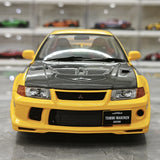 MotorHelix Mitsubishi 2000 Lancer Evolution VI GSR Tommi Makinen Edition Yellow 1:18 – Sammelobjekt aus Druckguss