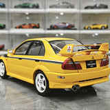 MotorHelix Mitsubishi 2000 Lancer Evolution VI GSR Tommi Makinen Edition Yellow 1:18 – Sammelobjekt aus Druckguss