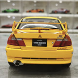 MotorHelix Mitsubishi 2000 Lancer Evolution VI GSR Tommi Makinen Edition Yellow 1:18 – Sammelobjekt aus Druckguss