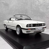 [Norev] 1:18 BMW 1991 E30 325i Cabriolet wit modelauto Hars