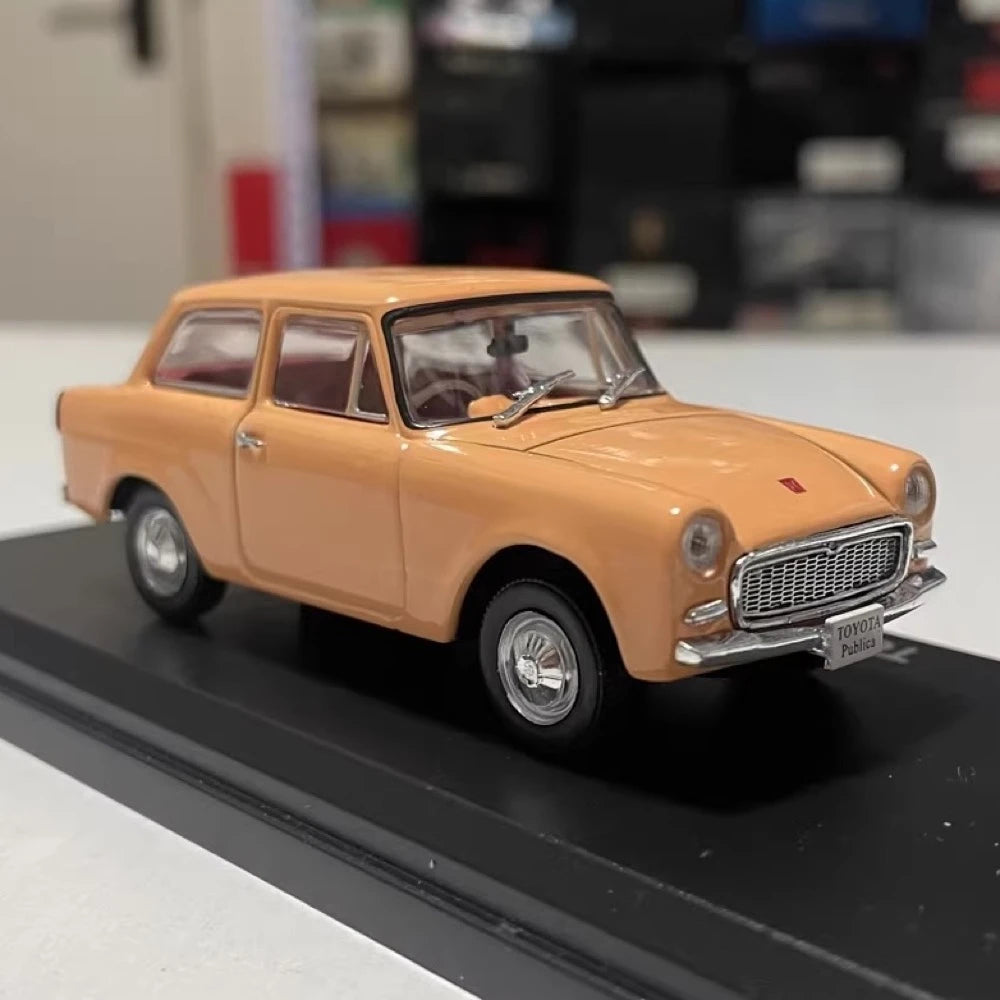[Norev] 1:43 Toyota 1961 Publica 700 arancione modellino di auto Die-Cast