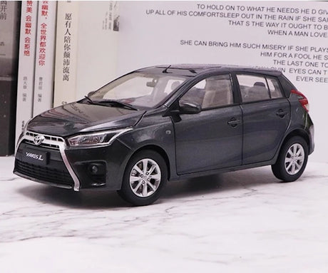 [OEM] 1:18 Toyota 2013 Yaris grå modellbil Die-Cast