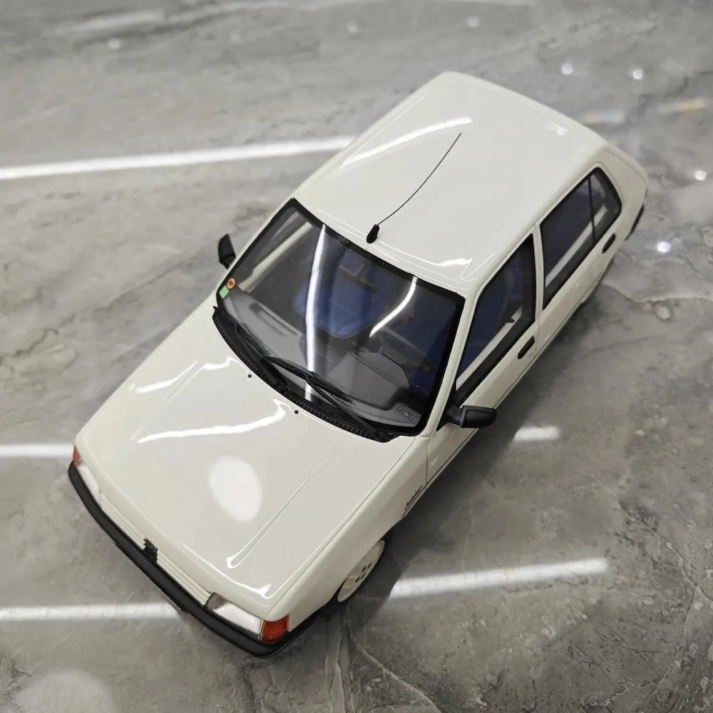 [OTTO] 1:18 Peugeot 1988 205 Junior Blanc Meije Model Car Resin