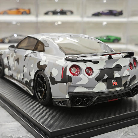 نموذج واحد Nissan 2007 GT-R R35 1:18 التمويه الرمادي – راتنج نموذجي قابل للجمع