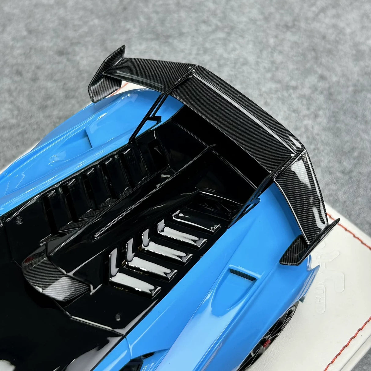 Runner Lamborghini 2021 Huracan STO Novitec Blue 1:18 – نموذج راتنج قابل للجمع