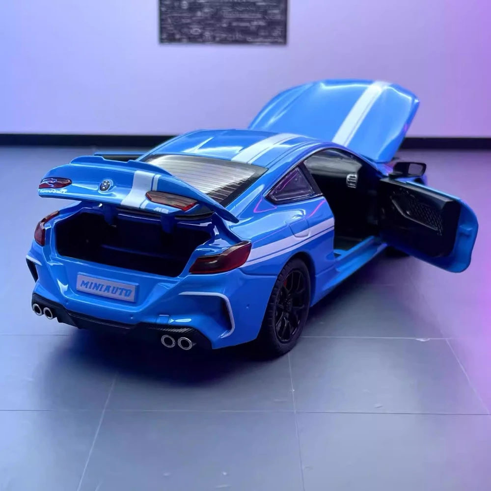[TOY] 1:24 BMW 2019 F9X MANHART MH8 800 blå modellbil Die-Cast