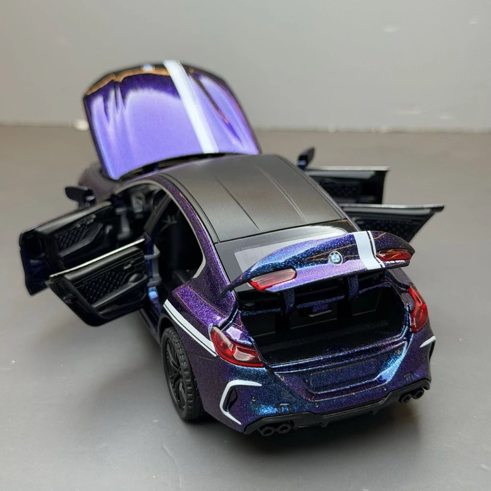 [TOY] 1:32 BMW 2019 F9X MANHART MH8 800 violet voiture miniature Die-Cast
