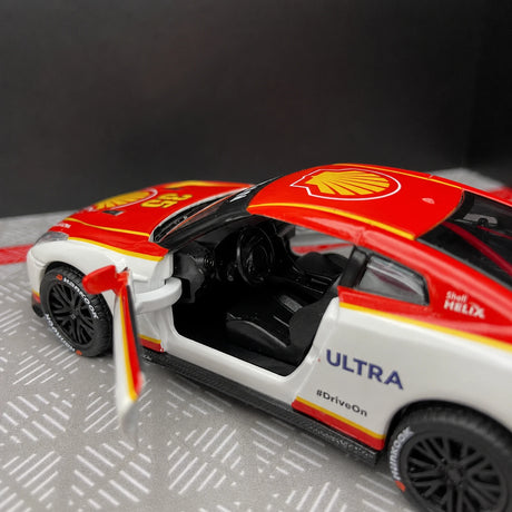 Nissan 2009 GT-R R35 طلاء شل #35 1:36 نموذج عرض مصبوب - عرض 11