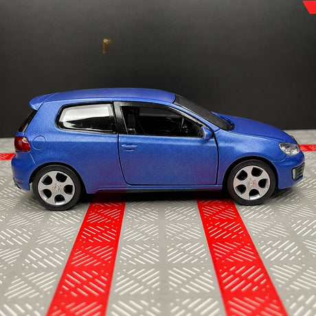 [TOY] 1:36 Volkswagen 2010 Golf GTI blu modellino di auto Die-Cast