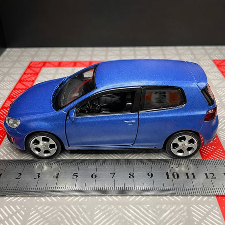 [TOY] 1:36 Volkswagen 2010 Golf GTI blu modellino di auto Die-Cast