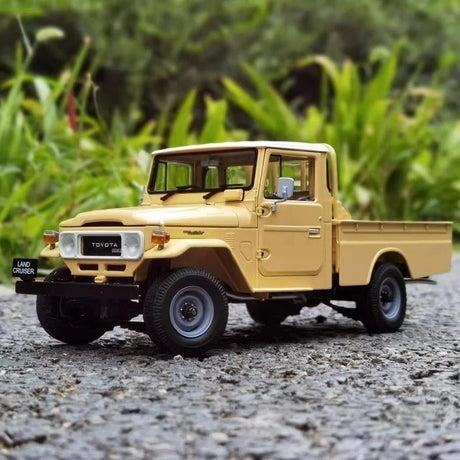 [Kyosho] 1:18 Toyota 1980 Land Cruiser LC40 Pickup geel modelauto Die-Cast
